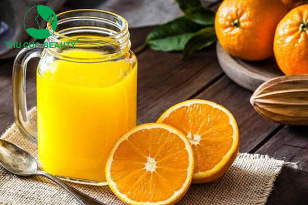 Nâng mũi có được uống nước cam không