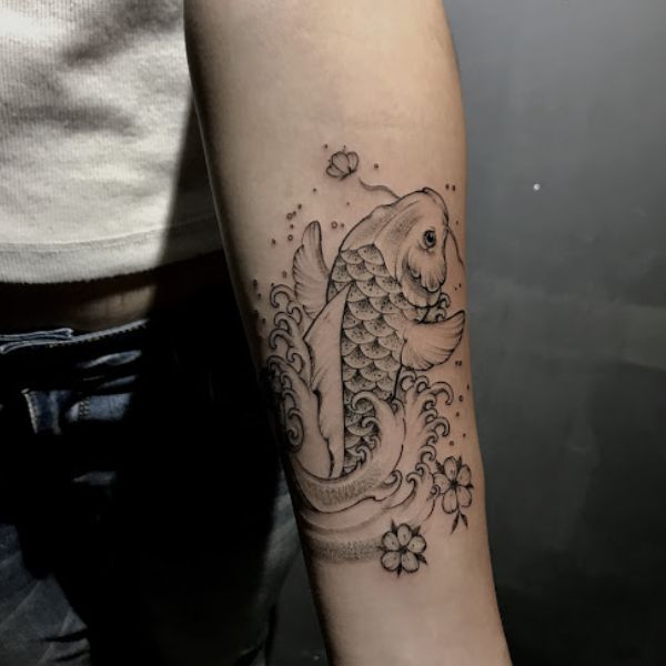 Tattoo chú cá chép hóa thành rồng nhỏ