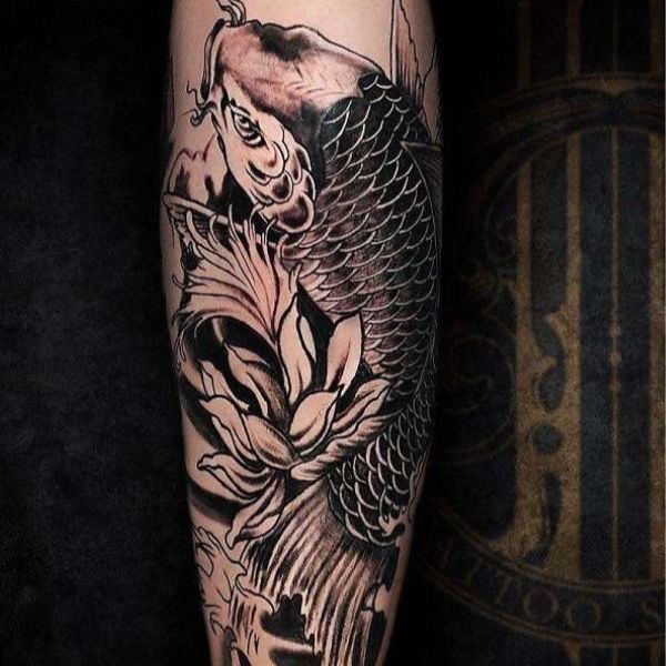 Tattoo chú cá chép hóa thành rồng ở cánh tay