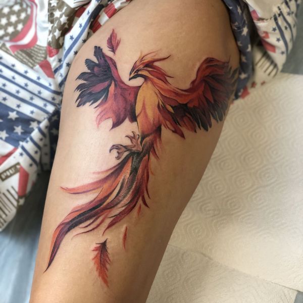 Tattoo phượng hoàng lửa bắp chân