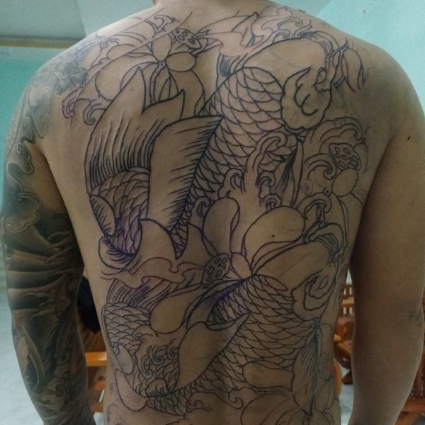 Mẫu tattoo chú cá chép hoa sen