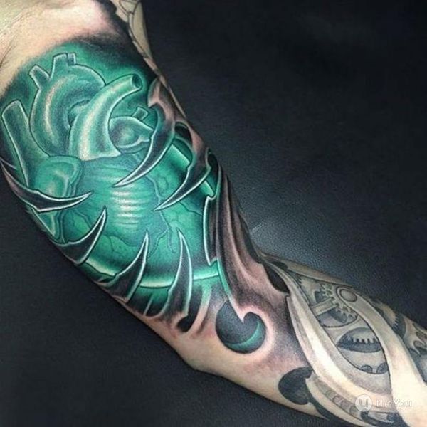 Tattoo bắp tay trái tim xanh