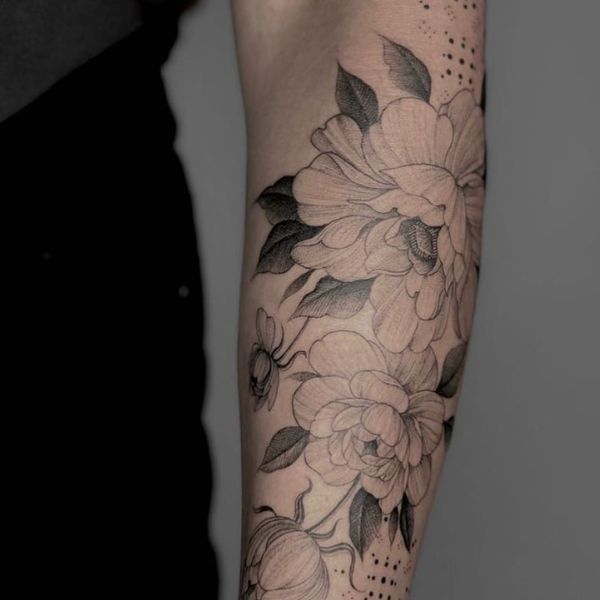 Tattoo cánh tay hoa cúc