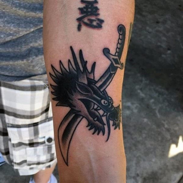 Tattoo cánh tay nam đầu rồng