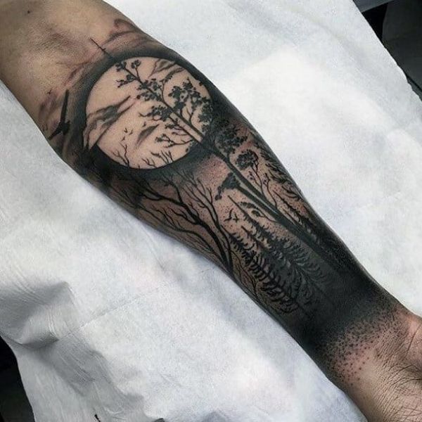 Tattoo cánh tay nam khu rừng sinh động