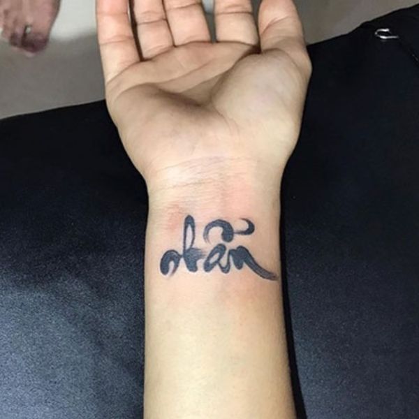 Tattoo chữ nhẫn ở cổ tay