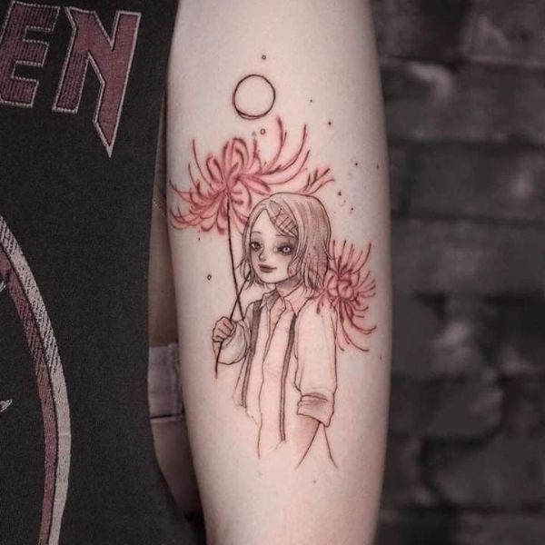 Tattoo hoa bỉ ngạn và cô gái