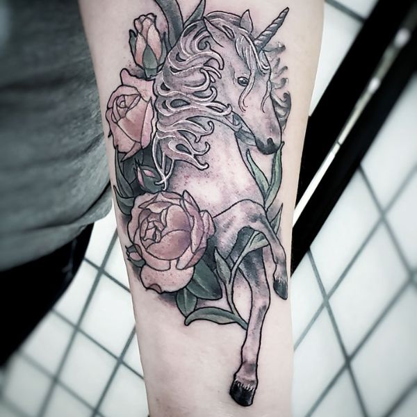 Tattoo kỳ lân và hoa