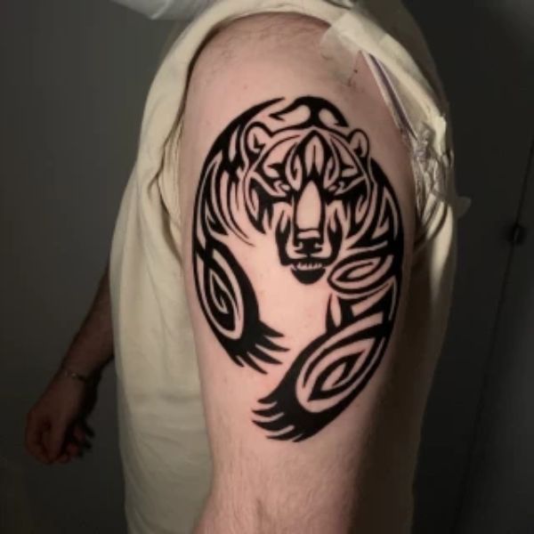 Tattoo maori con cái hổ
