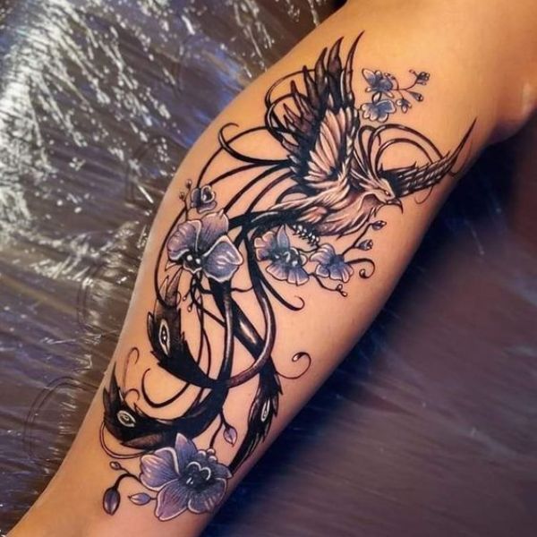 Tattoo phượng hoàng với hoa anh túc