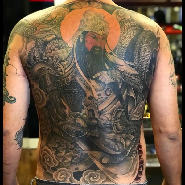Tattoo quan công và rồng quấn quanh