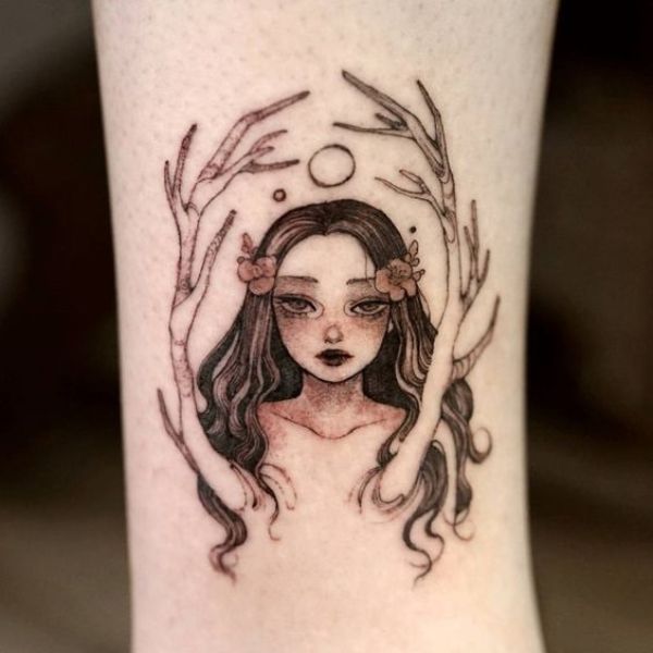 Tattoo cô gái buồn mọc cành trên người