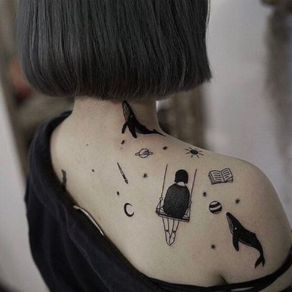 Tattoo cô gái buồn ngồi xích đu