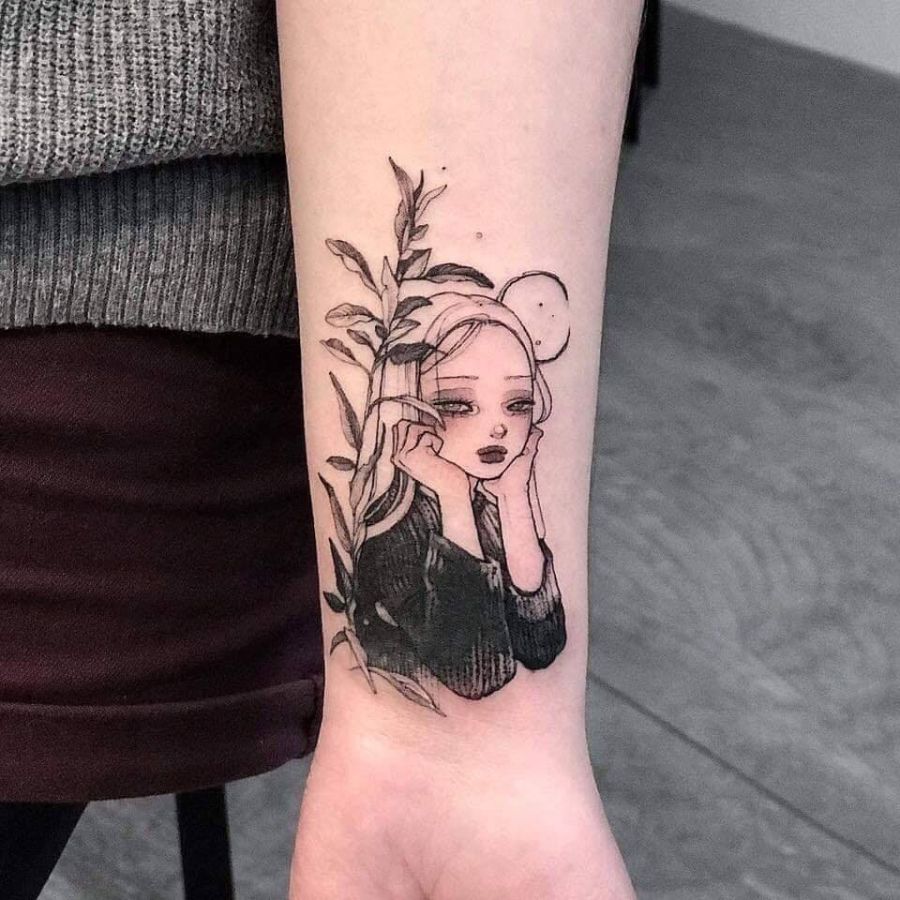 Tattoo cô gái buồn ở cổ tay