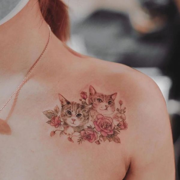 Tattoo con cái mèo cho tới nữ