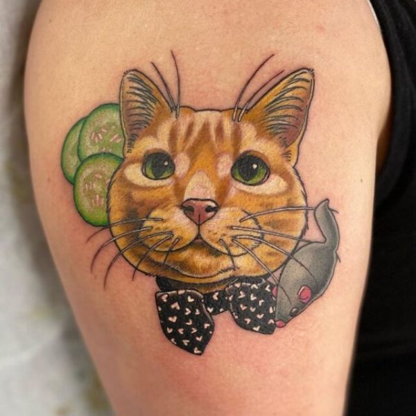 Tattoo con mèo đẹp cho bắp tay nam