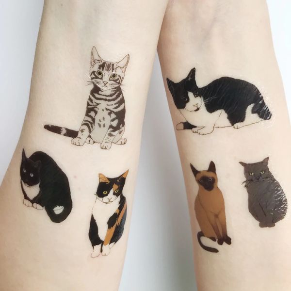 Tattoo con cái mèo gia đình