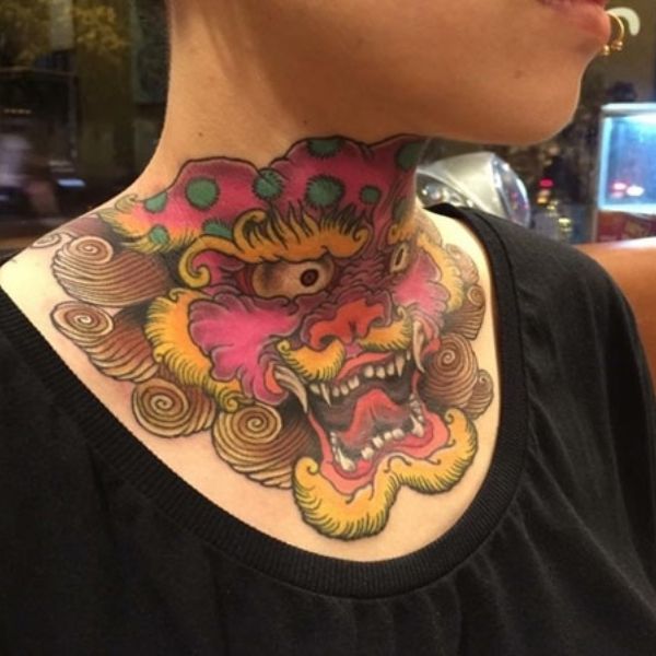 Tattoo đầu rồng ở cổ