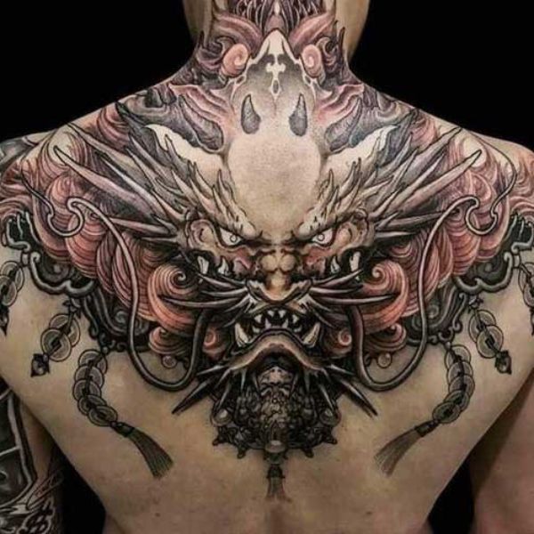 Tattoo đầu rồng sau gáy
