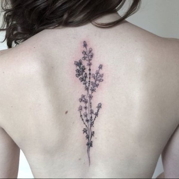 Tattoo đẹp nhất cho tới phái nữ ở sườn lưng bông lan