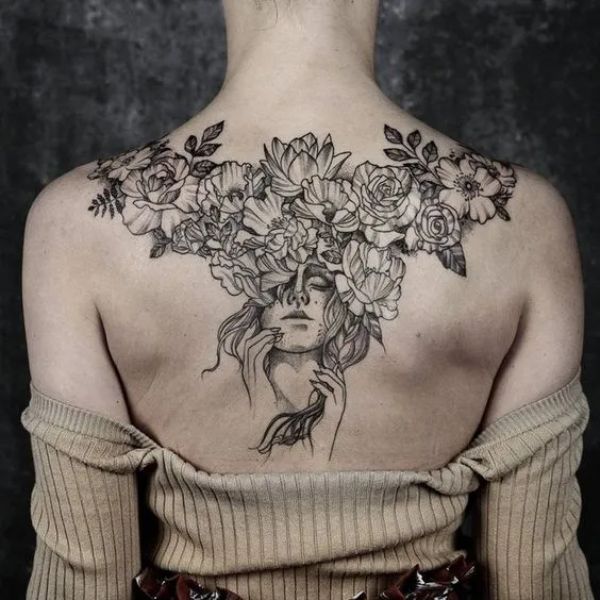 Tattoo đẹp cho nữ ở lưng cô gái hoa