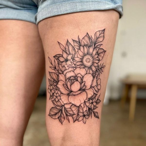 Tattoo đùi hoa kiểu mẫu đơn đẹp