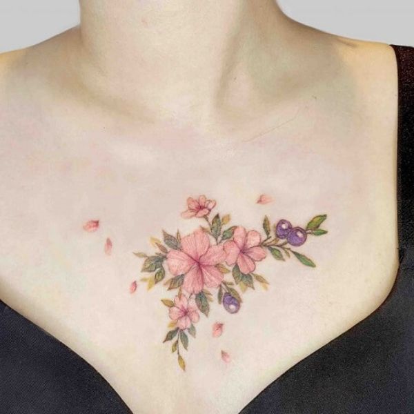 Tattoo ở ngực cho tới phái nữ chùm hoa đào