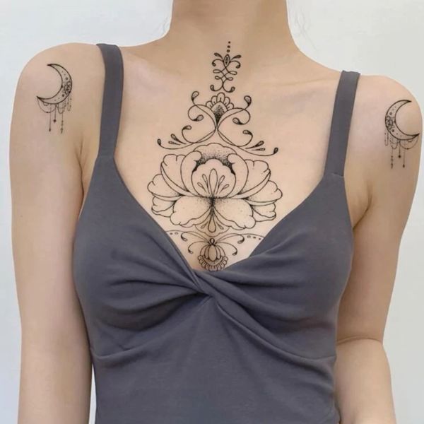 Tattoo ở ngực cho tới phái đẹp hoa đẹp