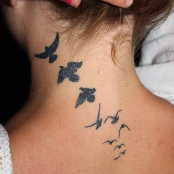 Tattoo sau gáy bầy chim