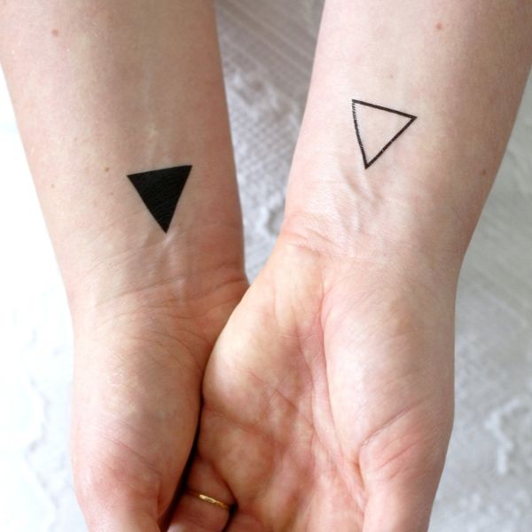 Tattoo tam giác cặp
