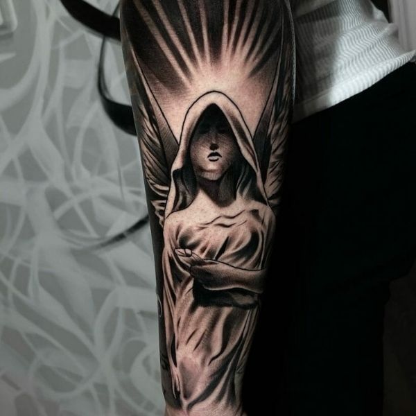 Tattoo thiên thần kín cánh tay