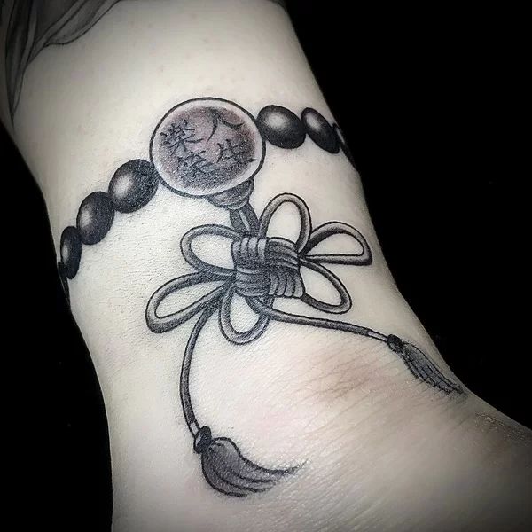 Tattoo vòng cồ bàn chân nhật
