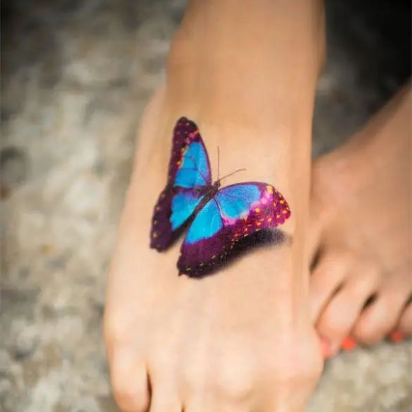 Tattoo con bướm bàn chân cho nữ đẹp