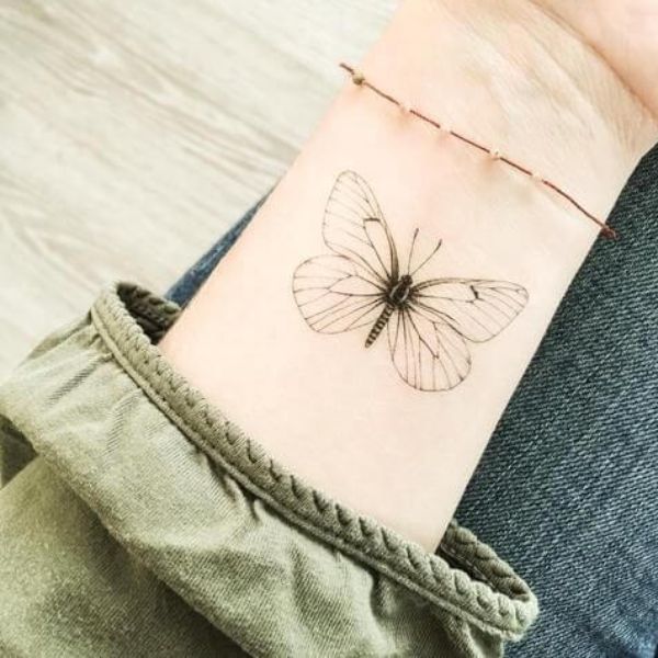 Tattoo con bướm cho nữ