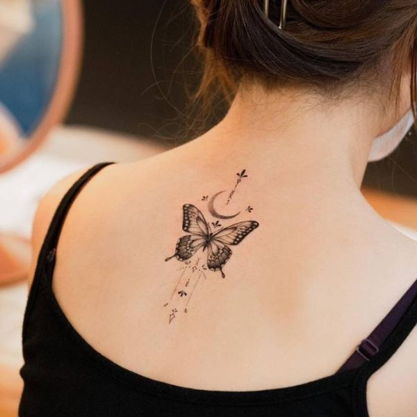 Tattoo con bướm gáy nữ