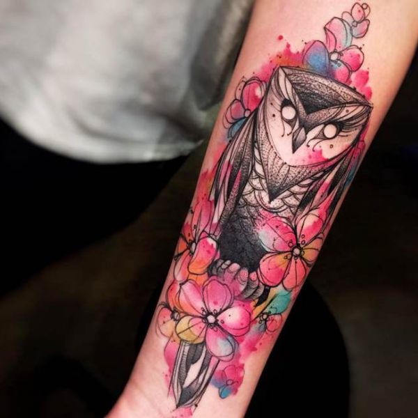 tattoo cú mèo ở cánh tay