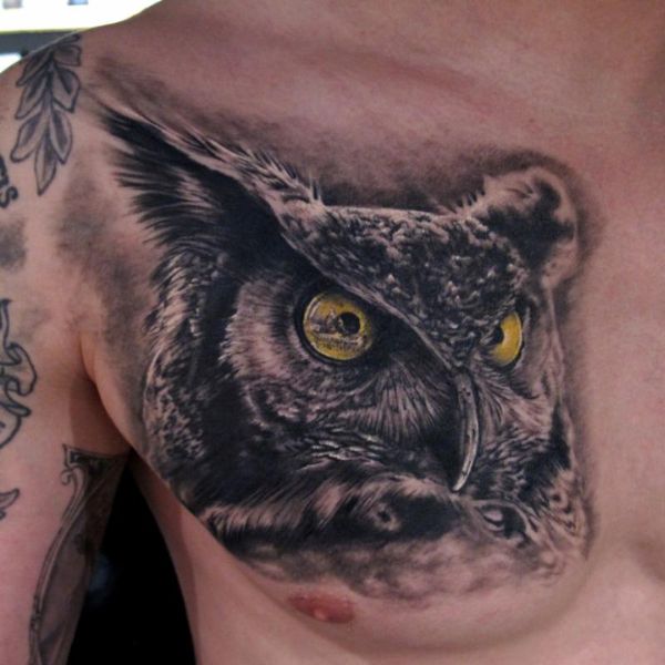 tattoo cú mèo trên ngực