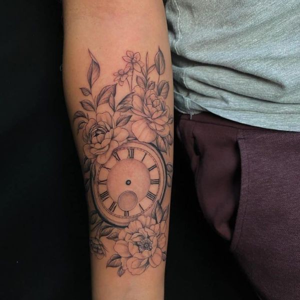 Tattoo đồng hồ và hoa lan