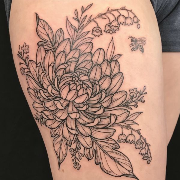 Tattoo hoa cúc ở đùi đẹp