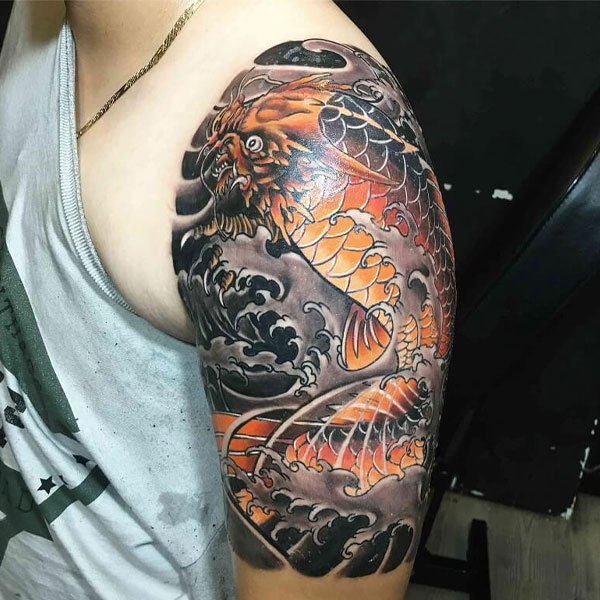 Tattoo cá Long bắp tay siêu đẹp