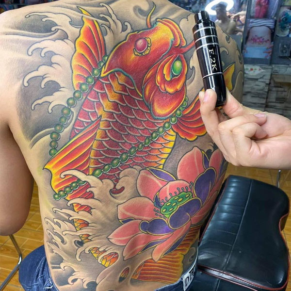 Tattoo cá Long bit lưng