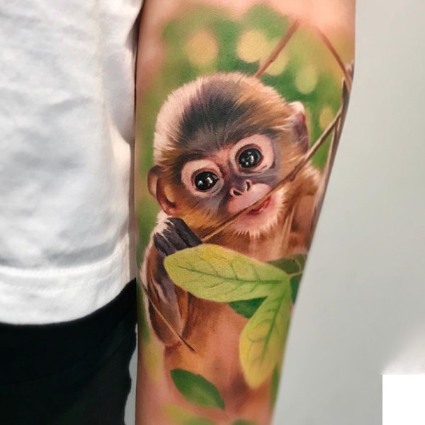 Tattoo con cái khỉ con