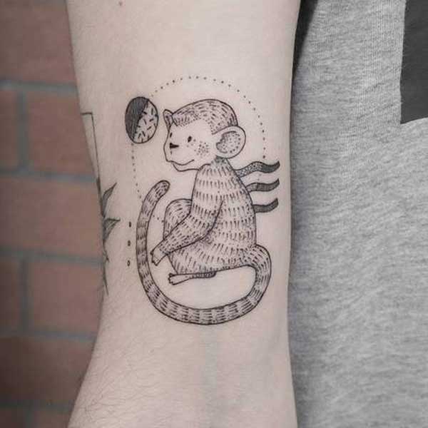 Tattoo con khỉ mini ở tay