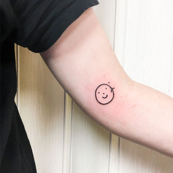 Tattoo mặt cười cute cho nam