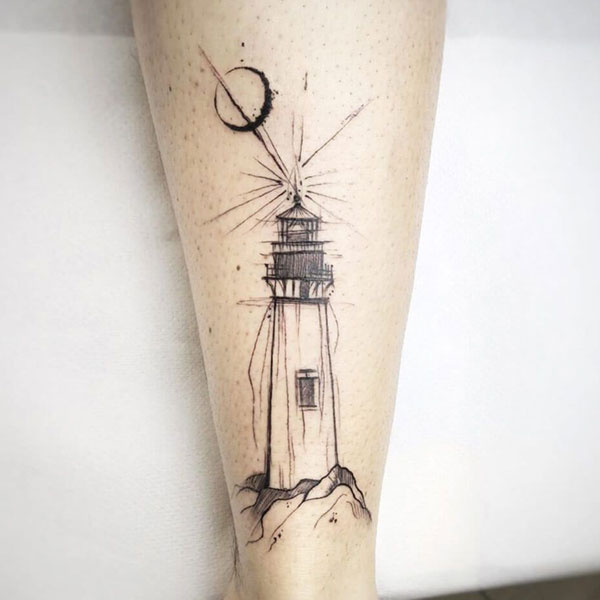 Tattoo ngọn hải đăng bắp chân