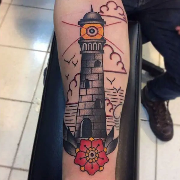 tattoo con hải đăng và hoa