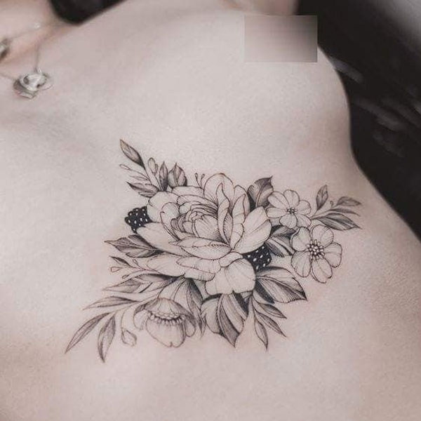 Tattoo trước ngực nữ bông hoa hồng