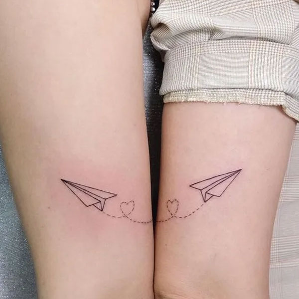 Tattoo cặp mini máy bay đẹp ở chân