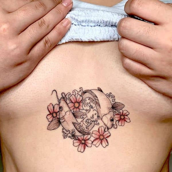 Tattoo cung song ngư ở ngực đẹp