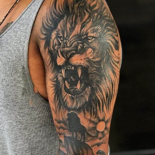 Tattoo cung sư tử kín bắp tay